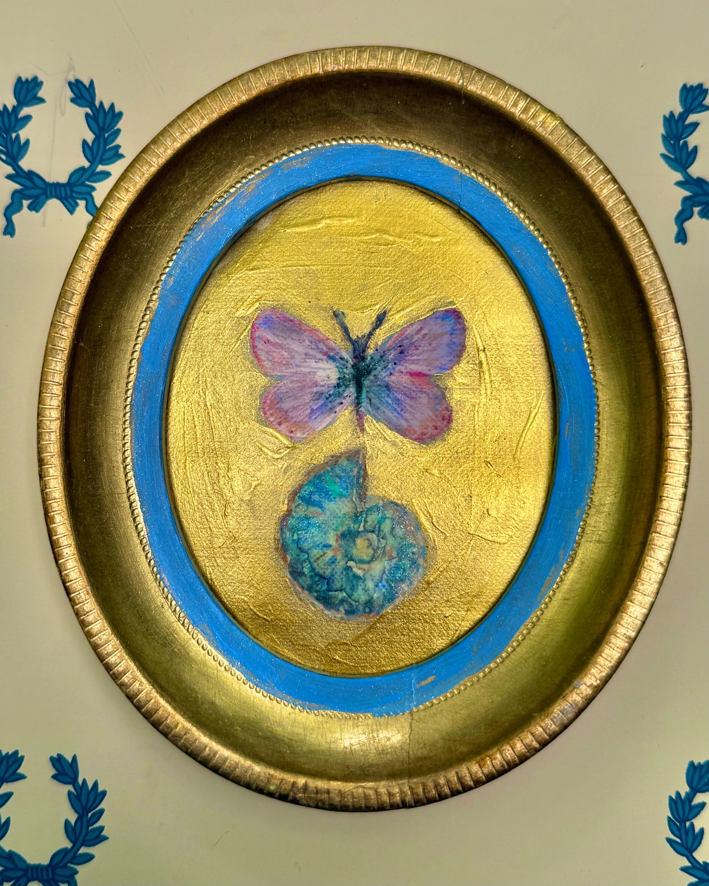 Iridescent Butterfly and Ammonite Fossil